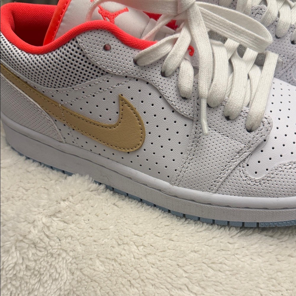 Nike White and Gold Sneakers with Red Accents